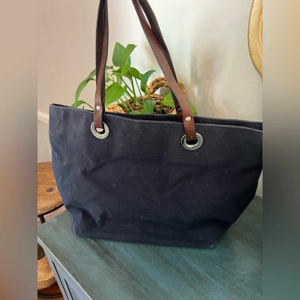 Banana Republic Tote Blue Lined with striped fabric.